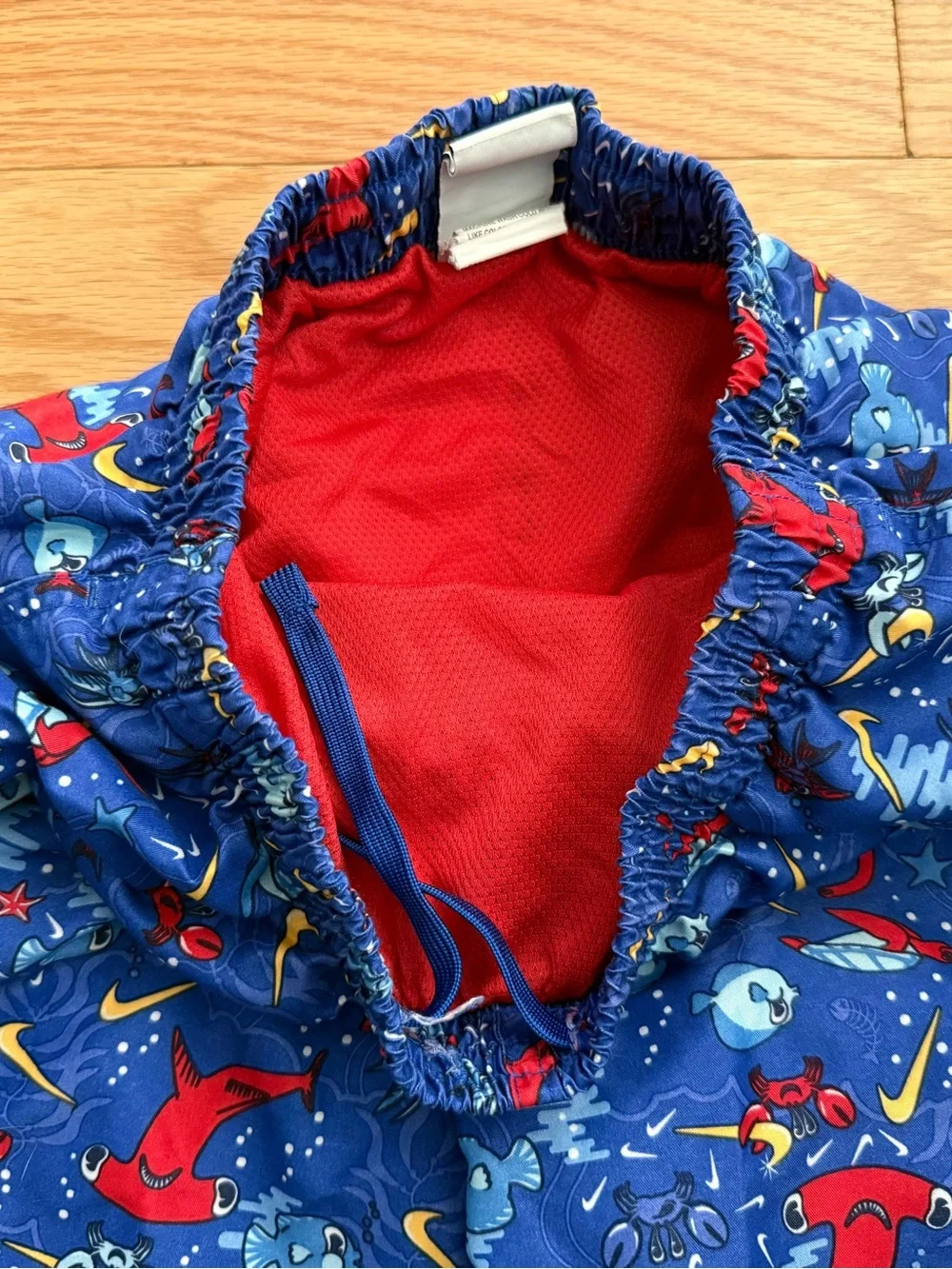 Nike fish crab swoosh blue colorful logo swim trunks YL
